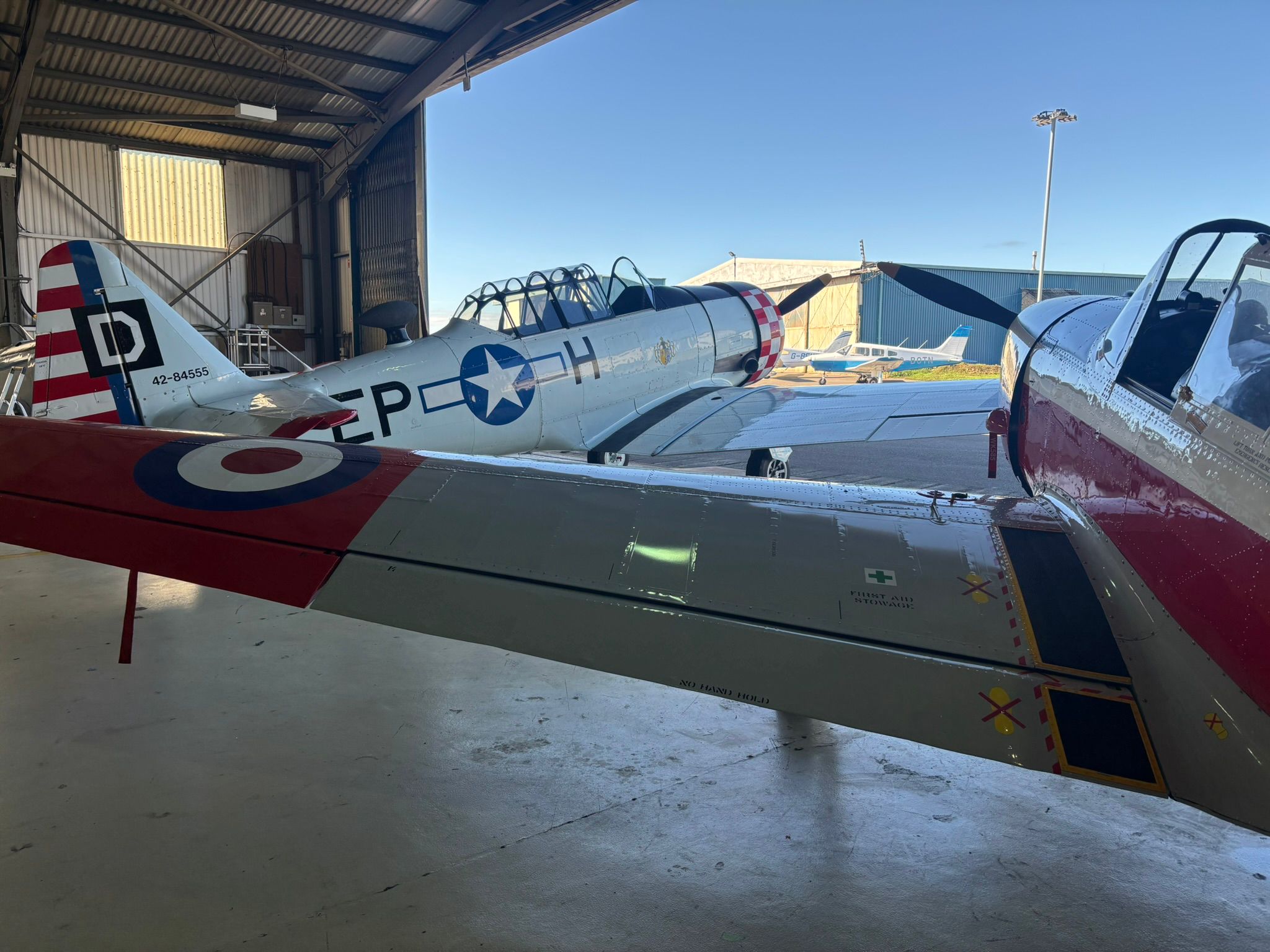 Vintage aeroplane in workshop hangar